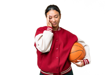 Young Uruguayan woman playing basketball over isolated wall  over isolated chroma key background with headache