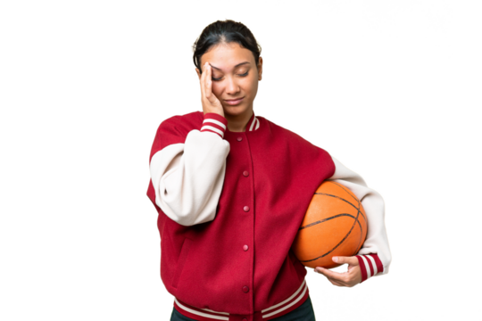 Young Uruguayan woman playing basketball over isolated wall  over isolated chroma key background with headache