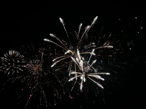 Fireworks display of lights in the sky with copy space 