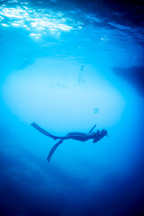 Free diver woman underwater