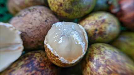 Selective focus on matoa fruit or Pometia pinnata. Matoa fruit is often found in Southeast Asia.