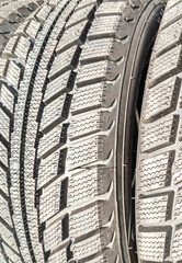 Tire tread on car wheels close-up
