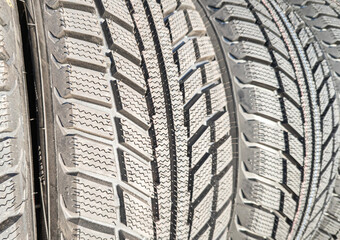 Tire tread on car wheels close-up