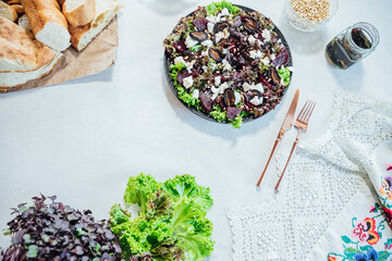 Delicious cooked food with bread on the table as background