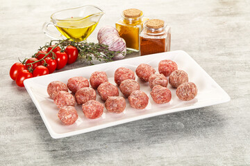 Uncooked raw beef meatball minced