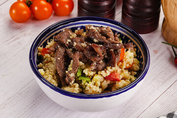 Traditional couscous with beef and vegetables