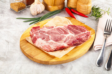 Raw pork neck steak for grill