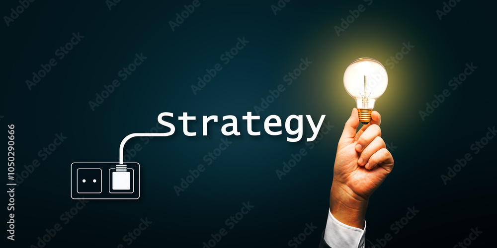 Poster hand holding a glowing lightbulb with strategy text on dark background, symbolizing a bright busines