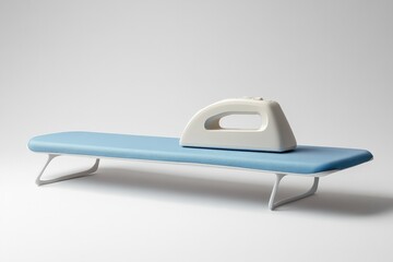 Clean and contemporary household chores scene with a modern white electric iron on a light blue ironing board against a white backdrop, copy space