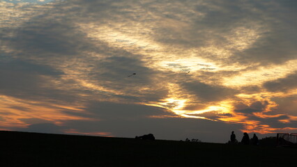 The beautiful sunset sky view with the colorful clouds as background
