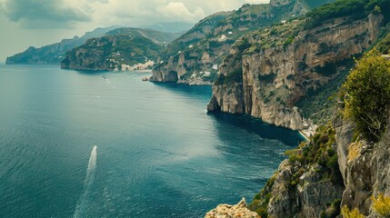 A dramatic view of the towering cliffs and deep blue waters of the Amalfi Coast with picturesque villages clinging to the cliffs and lush green hillsides, coastal setting with vibrant contrasts