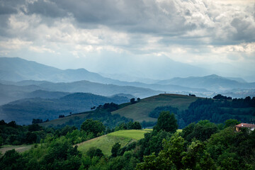 Rainy landscape and mountains in the background