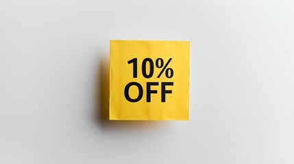 Black '10% OFF' Text on a Gold Square Paper Note. White Background with Copy Space