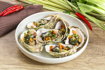 Baked oysters with green onion