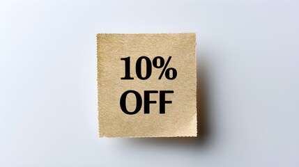 Black '10% OFF' Text on a Light Brown Square Paper Note. White Background with Copy Space