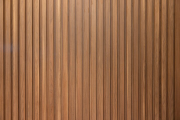 A wooden wall with a brown color. wooden wall background and texture.