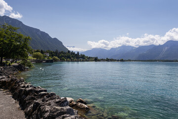 Scenic summer view of Lake Geneva (Lac Leman) near Montreux, in Vaud, Switzerland. With clear sky anf beautiful turquoise water. Copy space above.