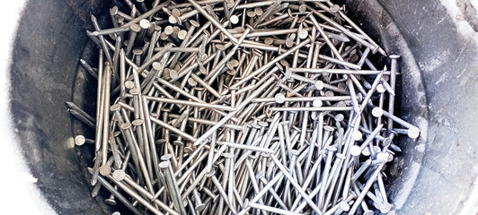Close-up of a piles of nails spike isolated 