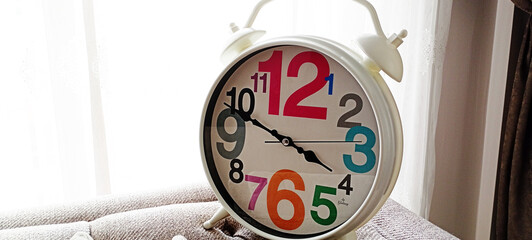 Minimalist Analog Wall Clock with White Face Ideal for Time Management and Modern Decor Concepts...
