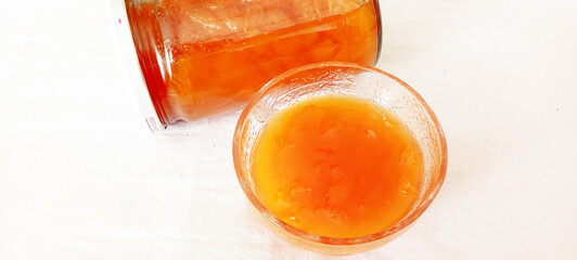 Cooking apricot jam healthy food background