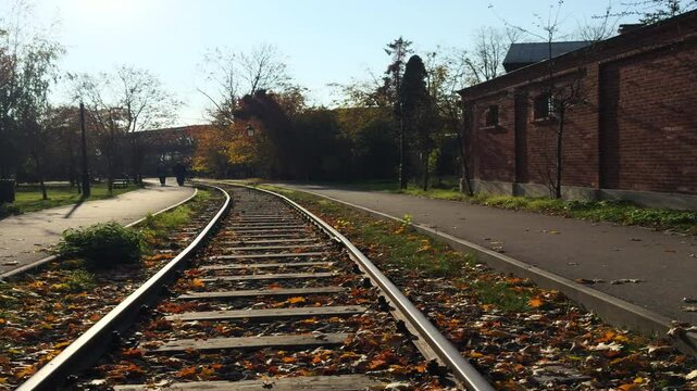 Railway tracks in autumn. Empty railway tracks on a sunny autumn day.