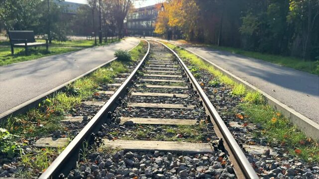 Railway tracks in autumn. Empty railway tracks on a sunny autumn day.