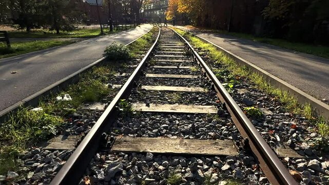 Railway tracks in autumn. Empty railway tracks on a sunny autumn day.
