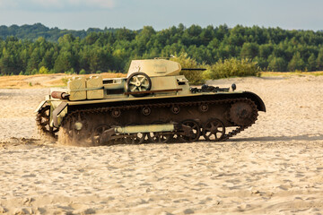 Fototapeta premium German PzKpfw I Panzerkampfwagen I Ausf. A ( Panzer I ) light tank in desert painting on the battlefield. Reconstruction siege of Tobruk durind WWII