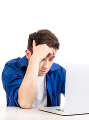 Tired Young Man with Laptop