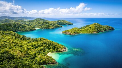 Aerial view of lush green tropical islands in the Mamanuca archipelago, surrounded by vibrant blue waters. No people included.