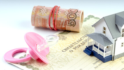 pacifier for the baby and the baby's birth certificate. Translation: birth certificate