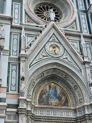 Florence, Italy - October 5, 2024: Discovering the city of Florence in autumn days. Frome the Duomo to Ponte Vecchio, old architecture covering the city. Beautiful sky reflected over Arno river.