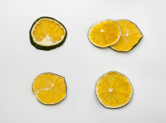 Dried Lime Slices on White Background