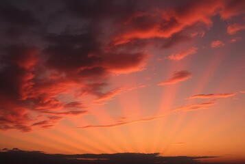 Fototapeta premium Sunset Rays Orange and red rays painting the sky at dusk