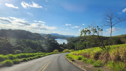 road with beautiful nature scenery and a lake