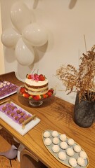 woman's 55th birthday, with sweets and decoration