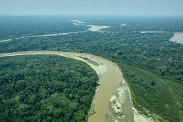 flying over manu river on Tambopata natural reserve. Madre de Dios Peru.
