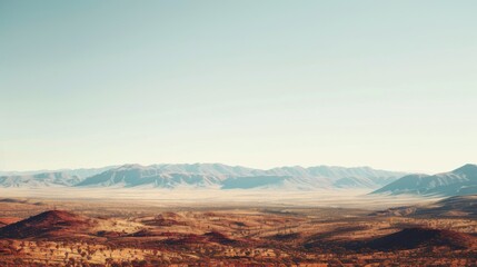 A serene view of the Australian Outback with vast red deserts and distant mountain ranges under a bright, clear sky, desert setting with expansive beauty