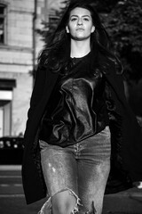 Naklejka premium A woman walking in the city