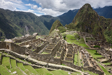Machu Picchu is a 15th-century Inca citadel located in the Andes Mountains of Peru, near the city...