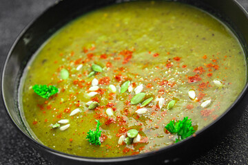 Spinach cream soup vegetable first course tasty food dish Fresh delicious gourmet food background on the table rustic food top view copy space top view keto and paleo diet Vegetarian and vegan food