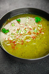 Spinach cream soup vegetable first course tasty food dish Fresh delicious gourmet food background on the table rustic food top view copy space top view keto and paleo diet Vegetarian and vegan food