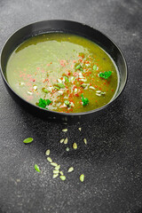 Spinach cream soup vegetable first course tasty food dish Fresh delicious gourmet food background on the table rustic food top view copy space top view keto and paleo diet Vegetarian and vegan food