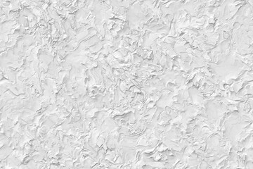 Textured white wall with a unique artistic finish showcasing intricate patterns and depth
