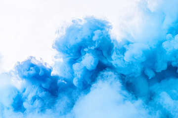 Fototapeta premium abstract blue smoke cloud swirling on white background