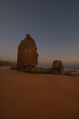 A sunset on Torre Del Loro beach, Mazagon, Huelva, Spain. Holidays, tourism, adventures, Doñana, Matalascañas. Vertical