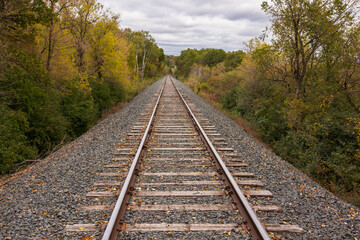 Fototapeta premium A Railroad Track Scenic Autumn Landscape