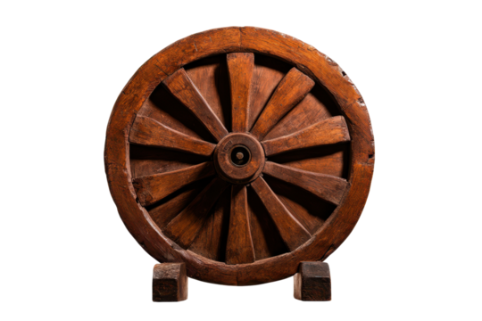 Old wooden wheel with spokes.