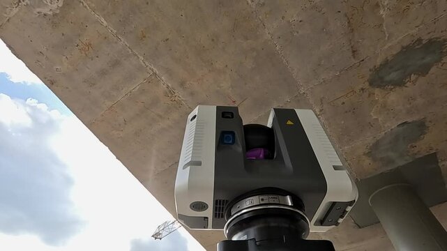 laser scanner geodetic instrument for measurements on a construction site. high-precision measurements using a 3D laser scanner on a construction site. Result of laser scanning of a point cloud.
