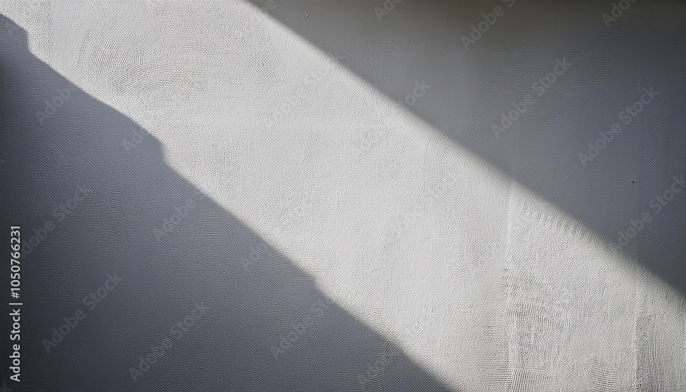 Poster textured plaster wall with soft diagonal light shadow. minimalist stucco surface background for inte